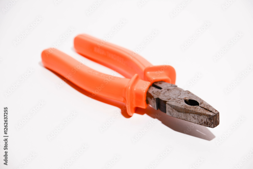 Pliers isolated on white background with clipping path, tool for repair. A closeup shot of a red pliers. Tools Pliers isolated on white background with clipping path, tool for repair. A closeup shot of a red pliers. Tools