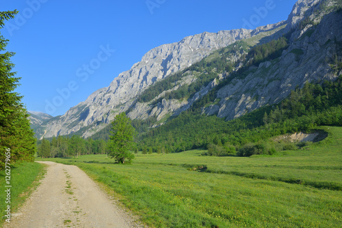 Blue sky above a wonderful spring panorama landscape in the valley Seetal. Viewed during perfect weather during a hike on the summit Hochschwab. Styria, Austria	
