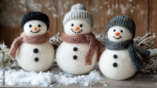 Wallpaper Mural Three Adorable Knit Snowmen on Rustic Wooden Background Torontodigital.ca