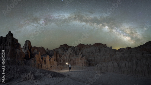 Obraz na plátne Milky Way Panorama arching over a rock formation in Cathedral Gorge State Park N