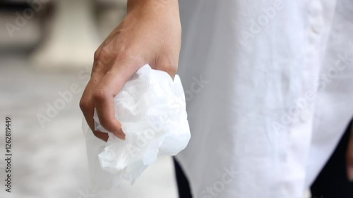 A good person picking up plastic garbage up from the floor, concept of no littering, keeping our city clean