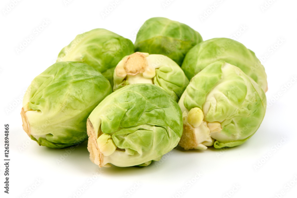 Fresh green Brussels sprouts, isolated on white background. High resolution image. Fresh green Brussels sprouts, isolated on white background. High resolution image.