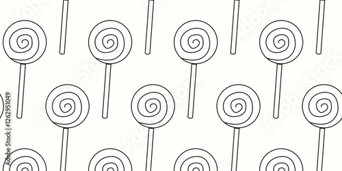 Colorful lollipops arranged in a playful pattern on a light background