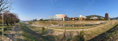 Obraz na płótnie Panorama from the river and Hwangnyong Temple w salonie