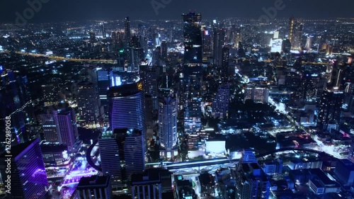 Wallpaper Mural Bangkok City Thailand Aerial 4K Hyperlapse view of downtown skyscrapers in Si Lom district at night - February 2025 Torontodigital.ca