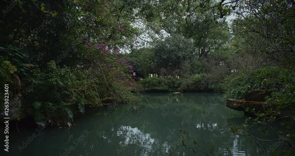 Chengdu, Sichuan, China. Pond At Park Of Wuhou Memorial Temple. Calmness And Tranquility. Calm Pond. Green Bushes. Silence And Peace. Garden Area. Comfortable Environment To Embrace Nature. Zen-like Chengdu, Sichuan, China. Pond At Park Of Wuhou Memorial Temple. Calmness And Tranquility. Calm Pond. Green Bushes. Silence And Peace. Garden Area. Comfortable Environment To Embrace Nature. Zen-like