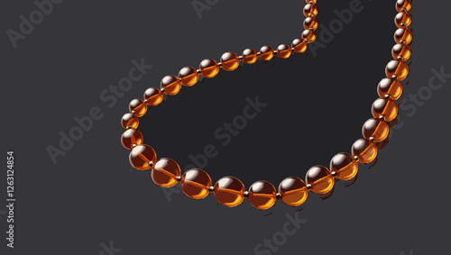 Elegant amber bead necklace displayed against a sleek black background highlighting its vibrant colors
