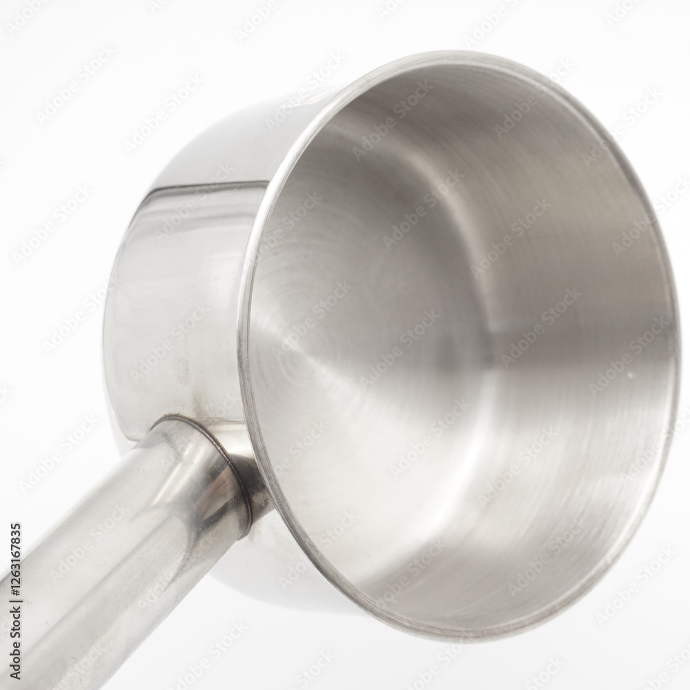 Industrial metal colander, can also be used for household stainless steel water scoop close up on white background Industrial metal colander, can also be used for household stainless steel water scoop close up on white background