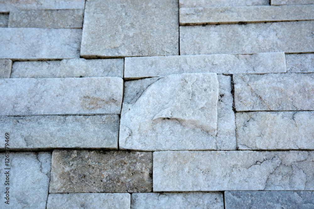 Fototapeta premium Textures of stone create a unique pattern in subtle tones
