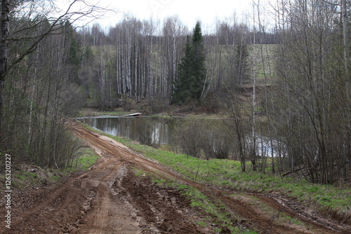 The second road running along the lake in the middle of spring photo