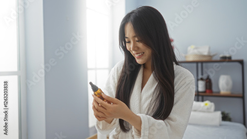 Woman enjoying wellness routine at a spa salon, examining beauty product in a serene indoor setting with soft natural light and minimalist decor. Free Download Woman enjoying wellness routine at a spa salon, examining beauty product in a serene indoor setting with soft natural light and minimalist decor. - GFXLoad