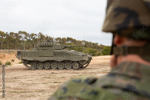 Vehiculo de infanteria Pizarro con cadenas durante unos ejercicios militares. photo