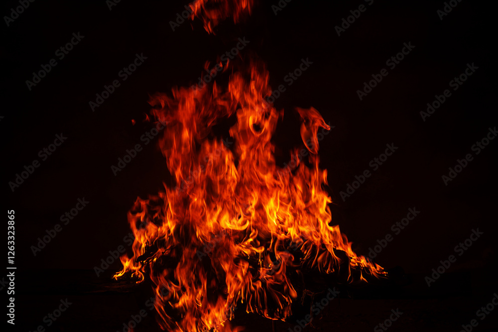 Obraz premium Fire flame texture for banner background. Burning fire lights. Burning big flame. Blaze flames overlay background.