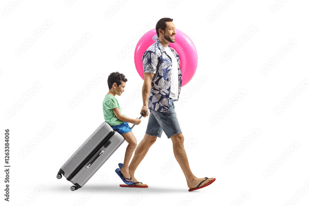 Man on a vacation pulling a suitcase with kid sitting on top Man on a vacation pulling a suitcase with kid sitting on top