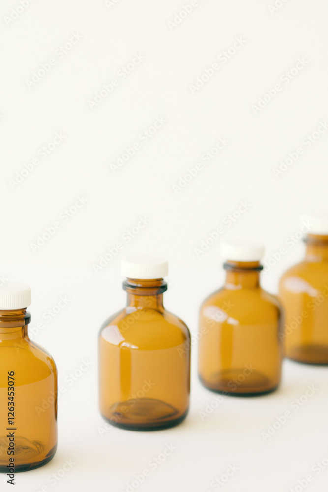 Elegant Amber Glass Bottles: Aesthetic and Functional Design for Beverages and Health Products in Minimalist Style Elegant Amber Glass Bottles: Aesthetic and Functional Design for Beverages and Health Products in Minimalist Style