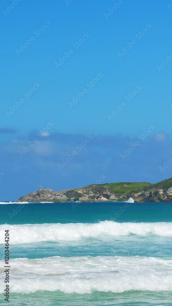 Macao coastline with turquoise water and stone cliff. Dominican Republic. Vertical footage Macao coastline with turquoise water and stone cliff. Dominican Republic. Vertical footage