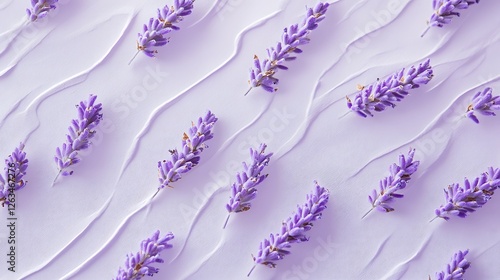 Lavender sprigs arranged on a textured purple background