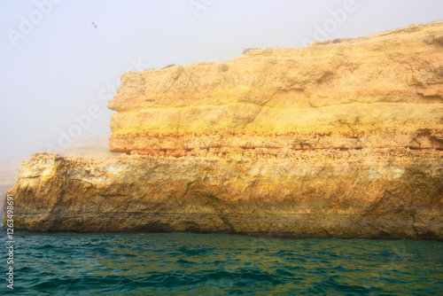 foggy landscape, the Algarve rock formation  is a unique and amazing natural wonder located in the coastal town of Porches, Portuga