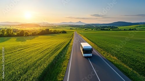 Modern luxurious bus journey along scenic countryside road sunrise view nature landscape