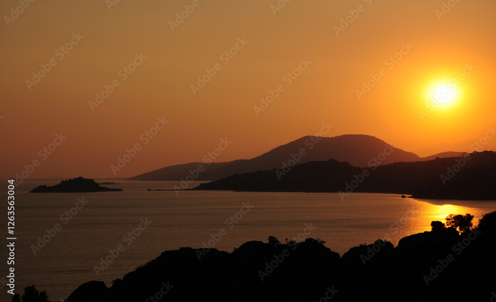 A sunset view from Kapikiri Village and Bafa Lake in Mugla, Turkey A sunset view from Kapikiri Village and Bafa Lake in Mugla, Turkey