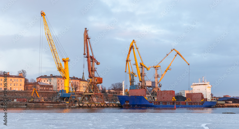 Seaport of Vyborg, cargo terminal coastal view with cranes Seaport of Vyborg, cargo terminal coastal view with cranes