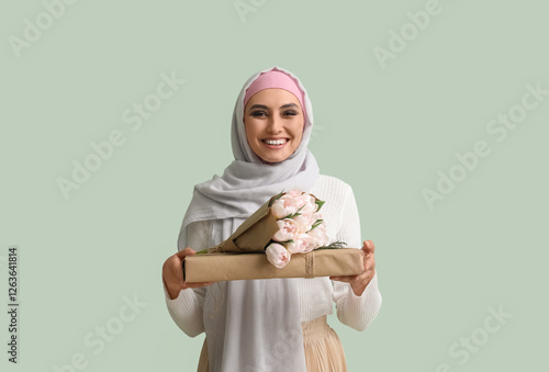Young Muslim woman with flo...