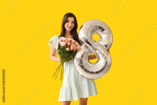 Beautiful young woman with ...