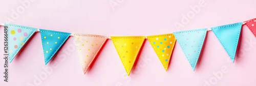 A string of colorful triangle flags creates a festive and cheerful banner for celebrations. Banner