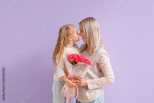 Little girl with tulips and...