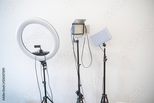 professional light sources against a white wall. photo