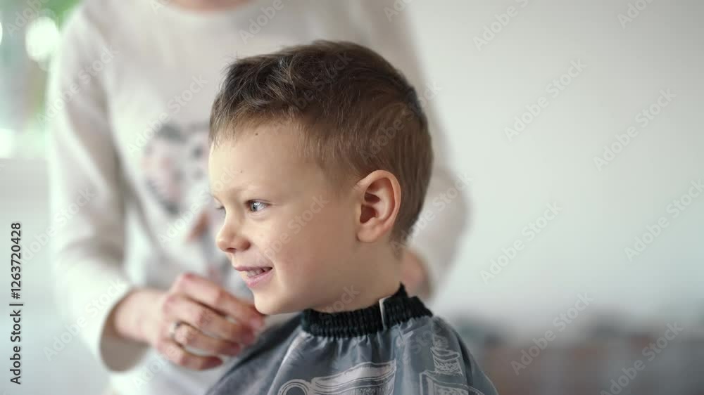 Smiling young boy getting ready for haircut at home. Time for a Haircut Smiling young boy getting ready for haircut at home. Time for a Haircut