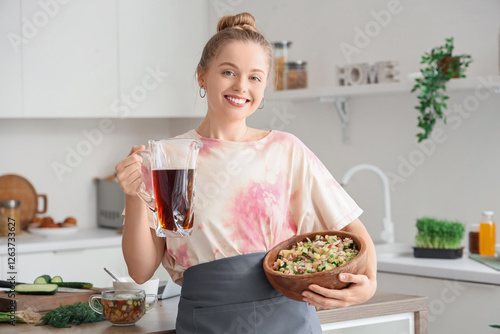 Young woman with kvass and ...