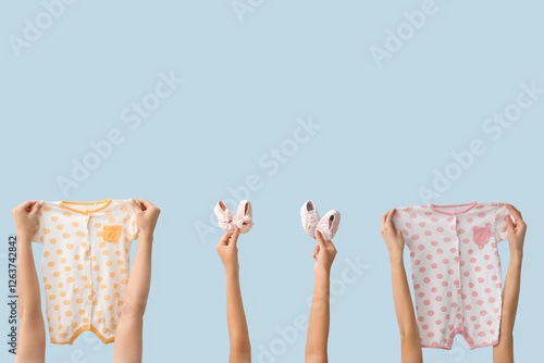 Female hands with baby body...