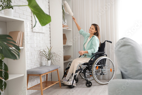 Young woman in wheelchair w...
