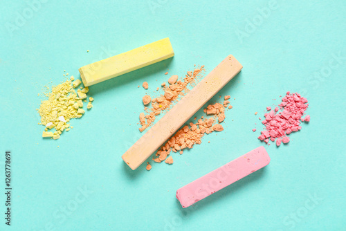 Colorful chalks with crushe...