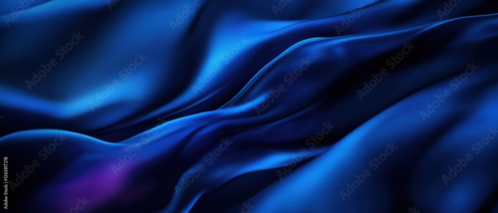 Obraz premium Luxurious dark blue silk satin fabric background with elegant folds and waves Smooth, shiny, and flowing textile texture Abstract backdrop for luxury, fashion, or design concepts