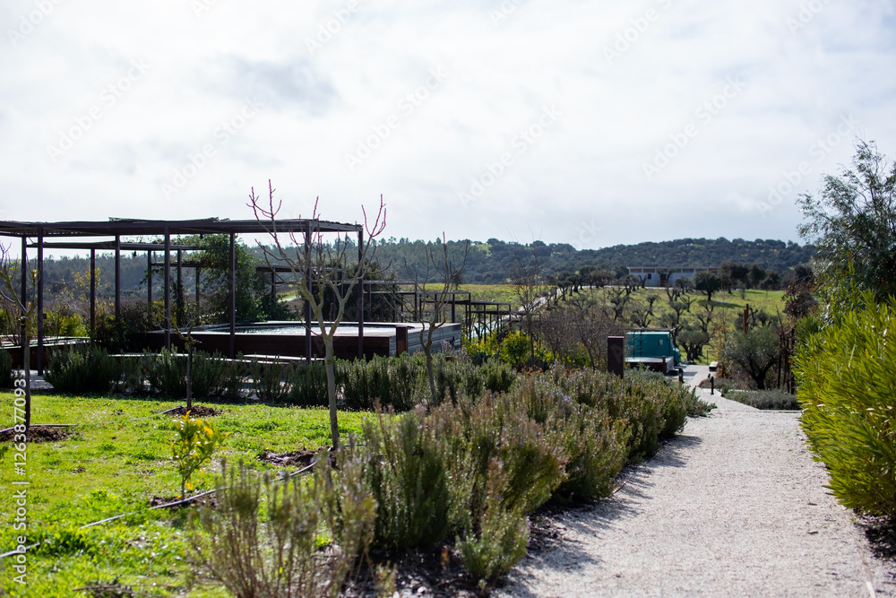 View of a path leading to a private garden in the countryside. View of a path leading to a private garden in the countryside.