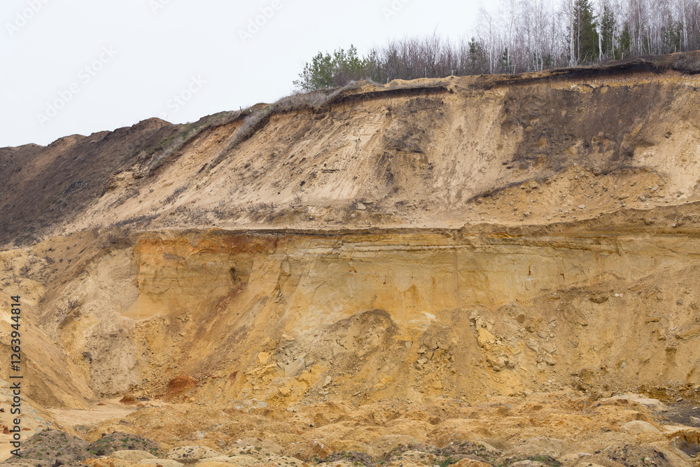 A large sand quarry. The place of sand extraction on an industrial scale. A large sand quarry. The place of sand extraction on an industrial scale.