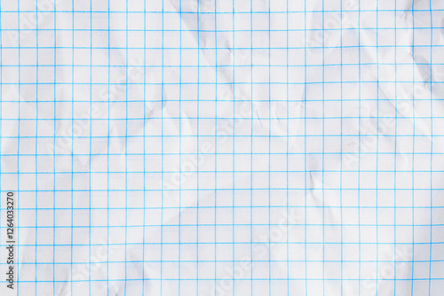 Wrinkled white graph paper with blue grid lines