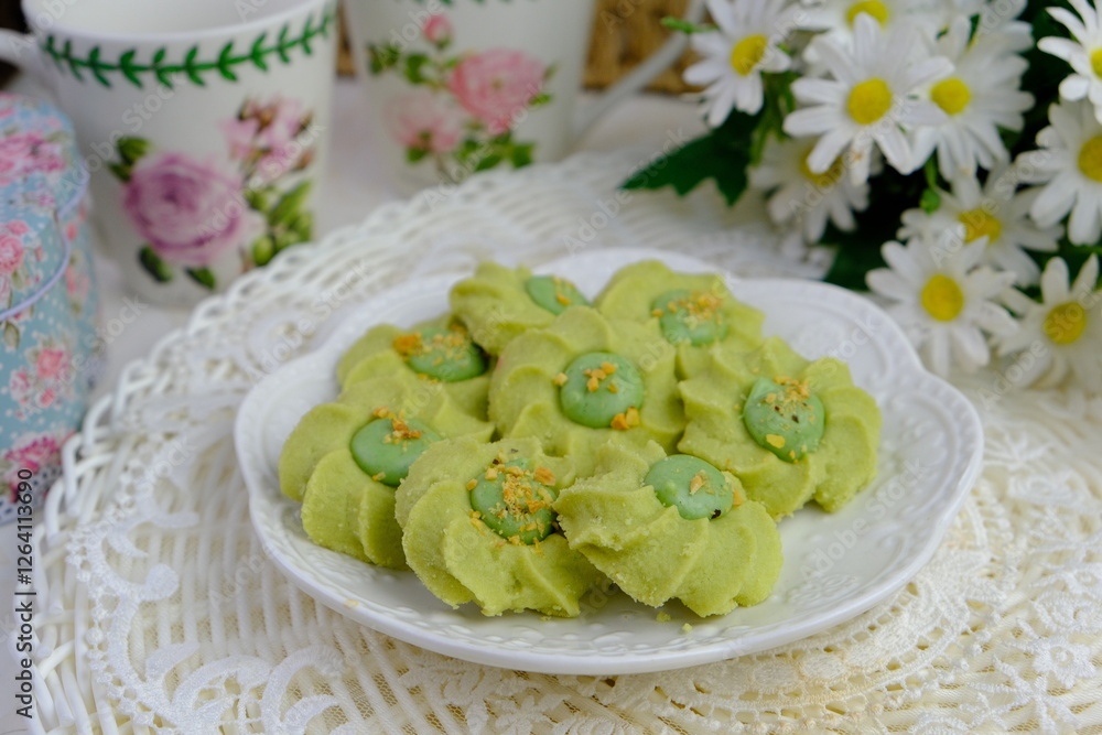 Popular cookies called in green known as pistachio in Malaysia during celebration of Eid Mubarak (Hari Raya) on white background. Popular cookies called in green known as pistachio in Malaysia during celebration of Eid Mubarak (Hari Raya) on white background.