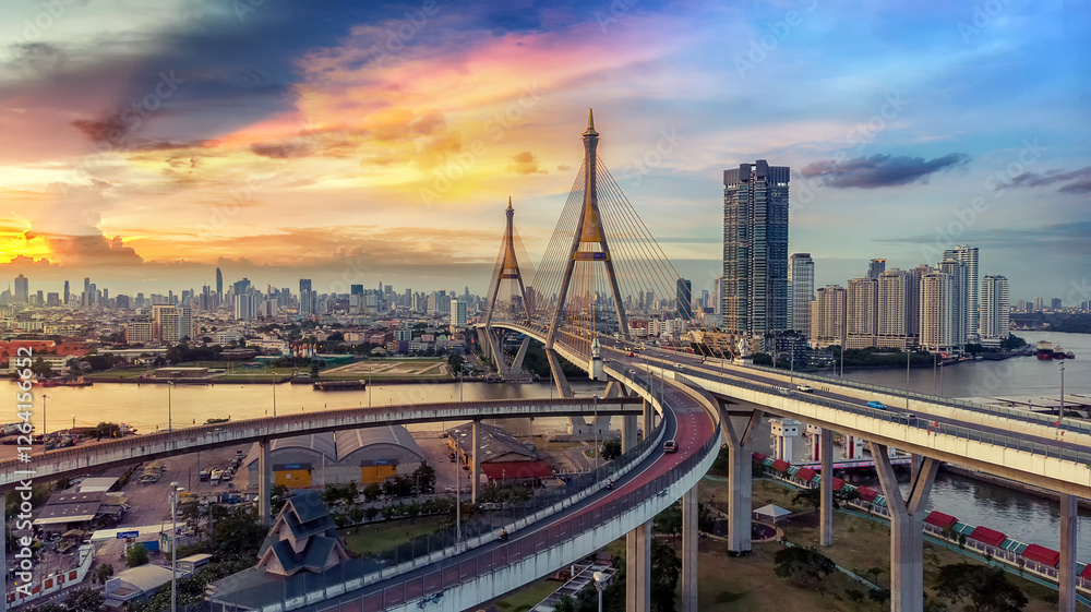 Fototapeta premium The Bhumibol Bridge (Industrial Ring Road Bridge) (Bangkok, Thailand) Beautiful view at sunset, Bangkok Expressway top view, expressway and motorway at sunset Aerial view from drone