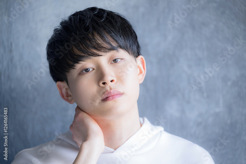 Man with serious expression Image of beauty, beauty and hair model Looking at the camera
