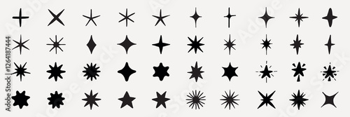Wallpaper Mural A collection of 36 black star icons on a grid. Various star shapes, sizes, and styles. Star icons for design, star patterns, and creative projects. Element vector set. Torontodigital.ca