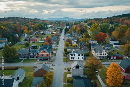 Obraz na płótnie Aerial view of charming autumnal town, vibrant foliage lines streets. Perfect for real estate, travel, or seasonal themes. w salonie