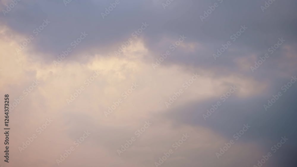 Dramatic Sunset Sky Clouds Background, Colourful Big Stormy Beautiful Storm Clouds in the Sky with Copy Space for Text Dramatic Sunset Sky Clouds Background, Colourful Big Stormy Beautiful Storm Clouds in the Sky with Copy Space for Text