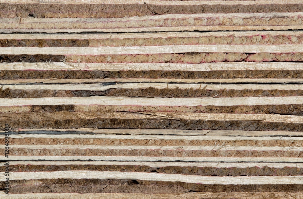 Softwood plywood layers lumber construction material closeup detail board. Softwood plywood layers lumber construction material closeup detail board.