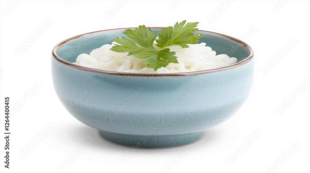 A bowl of cooked noodles garnished with fresh parsley, set against a clean white background, Ideal for use in culinary articles, menus, or recipes highlighting Asian cuisine, A bowl of cooked noodles garnished with fresh parsley, set against a clean white background, Ideal for use in culinary articles, menus, or recipes highlighting Asian cuisine,