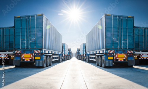 Many Semi Trailer Trucks on The Parking Lot at The Port. Big Rig. Economy Business Transport on Road. Shipping Container Import- Export. Warehouse Port. Trucking. Freight Logistics Transportation.