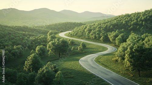 Winding road through lush green hills and forest at sunrise.