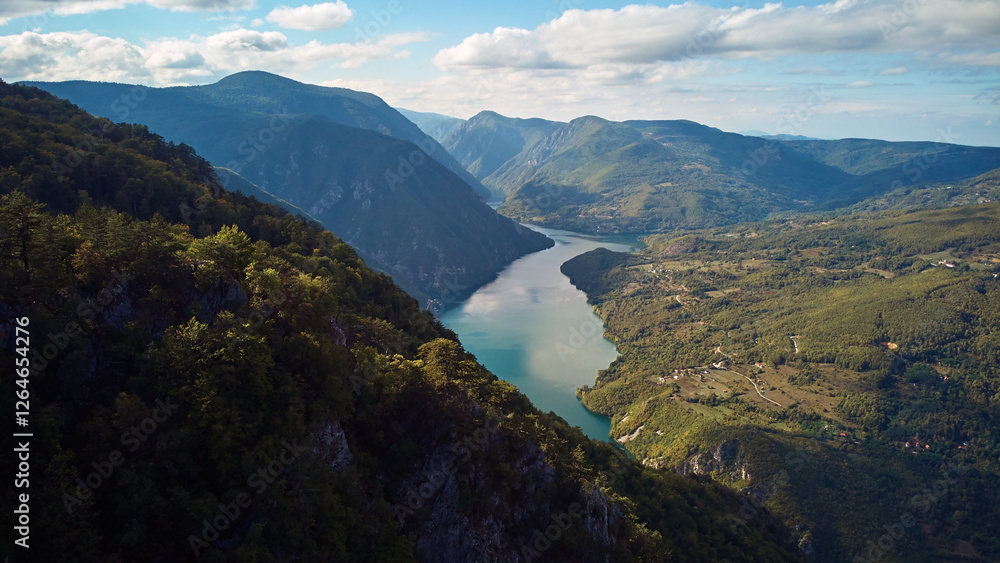 Obraz premium Drone aerial footage of river Drina and Tara mountain landscape..